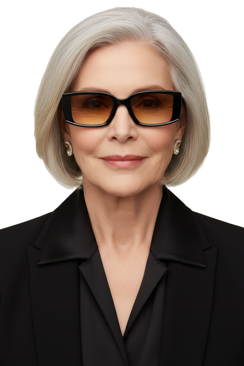 A pair of sunglasses with a modern gradient lense and a classic rectangle frame in black color.