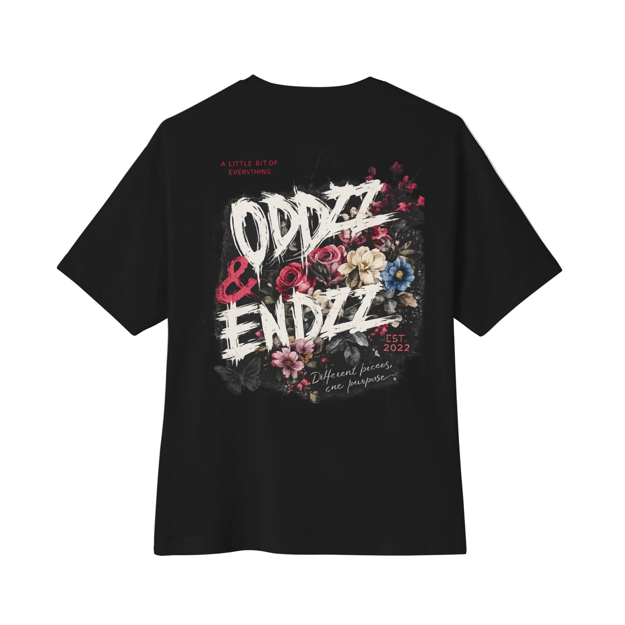 Different Pieces Oversized Tee featuring bold brush typography and vintage floral artwork by Oddzz & Endzz®