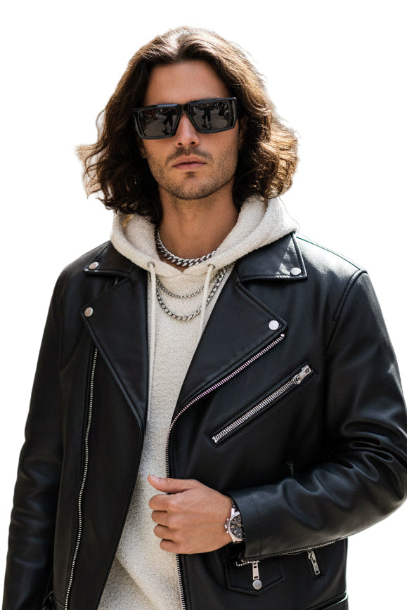 A pair of black, rectangular-framed sunglasses with a tort patterned arm.