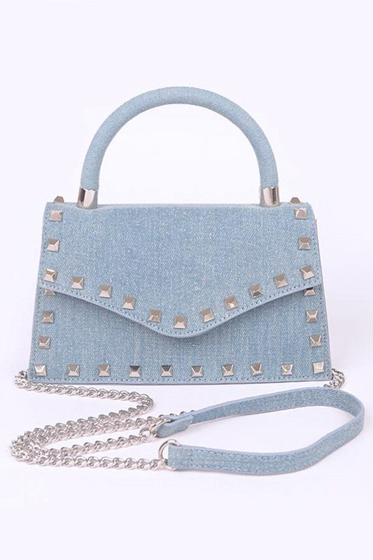 studded denim swing bag top handle statement handbag